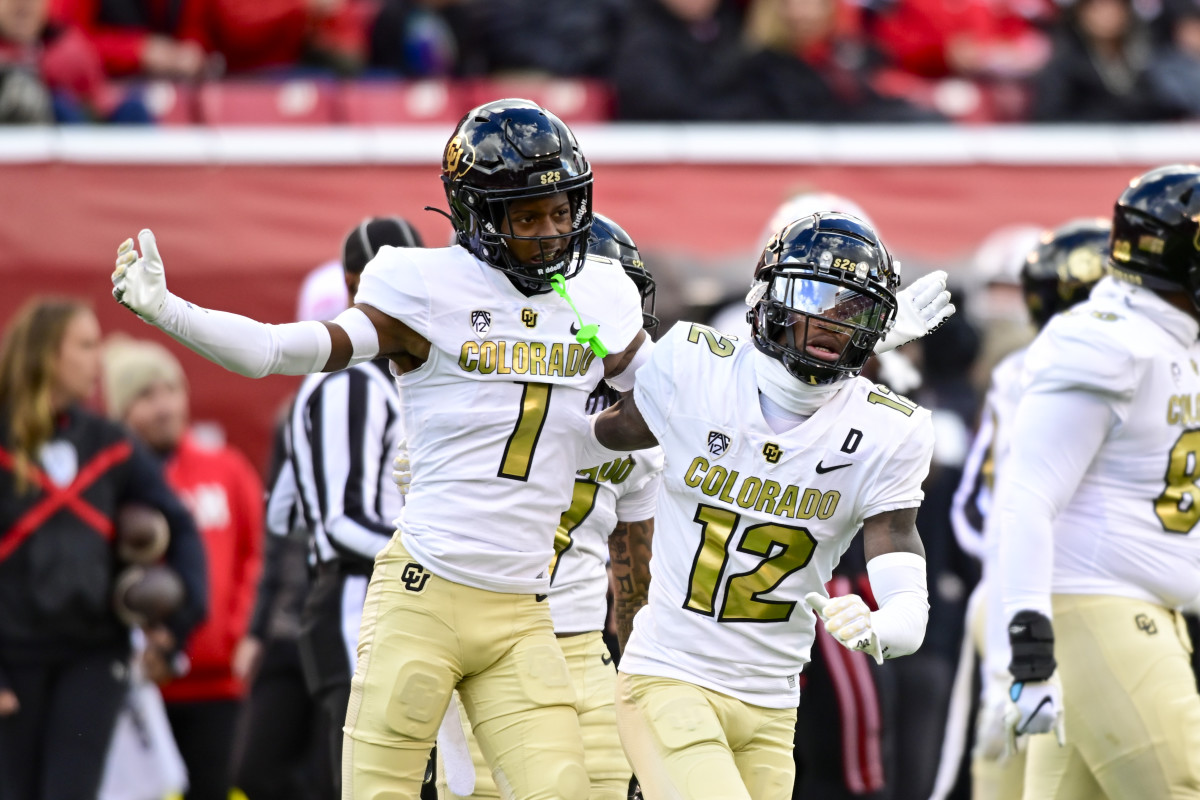 Nov 25, 2023; Salt Lake City, Utah, USA; Colorado Buffaloes athlete Travis Hunter (12) and cornerback Cormani McClain (1) react after a call against the Utah Utes at Rice-Eccles Stadium